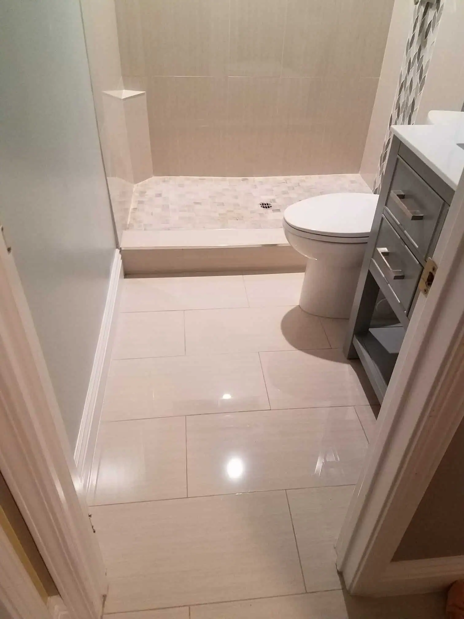 Contemporary bathroom with walk-in shower and sleek fixtures.