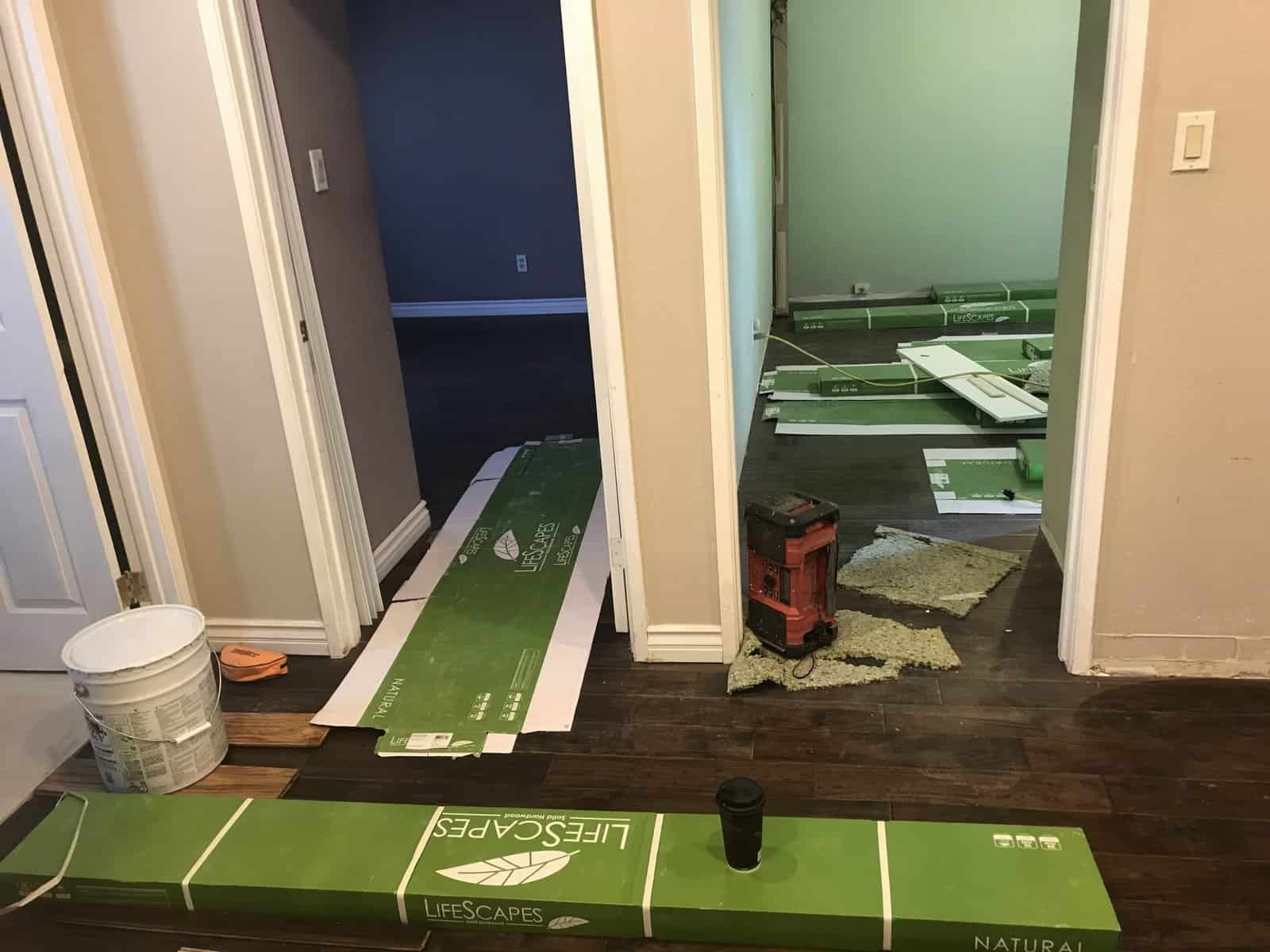 Interior renovation with flooring and drywall installation by MDM PRO BUILD.